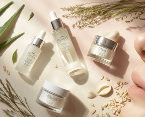 Anti-inflammatory skin care products including calming creams and serums with natural ingredients like aloe vera, green tea, and oatmeal, displayed on a soft pastel background.